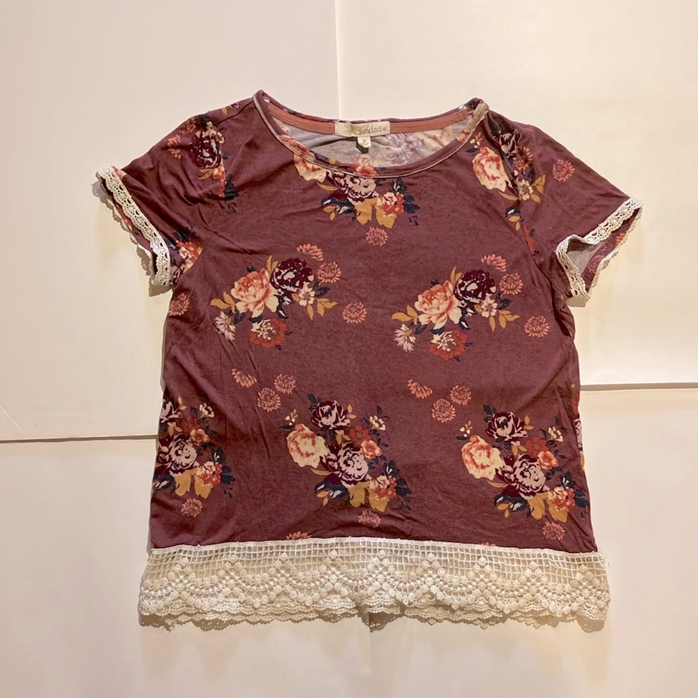 Floral top with lace accents